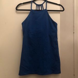 Blue workout top with fun back! Great condition!